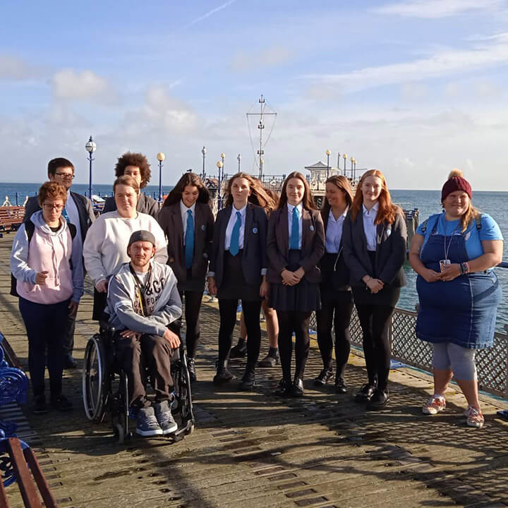 Swanage School students assemble on Swanage Pier